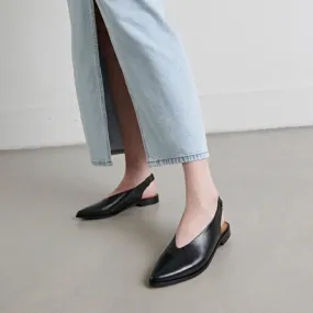 Ballet flats with open backs in black leather